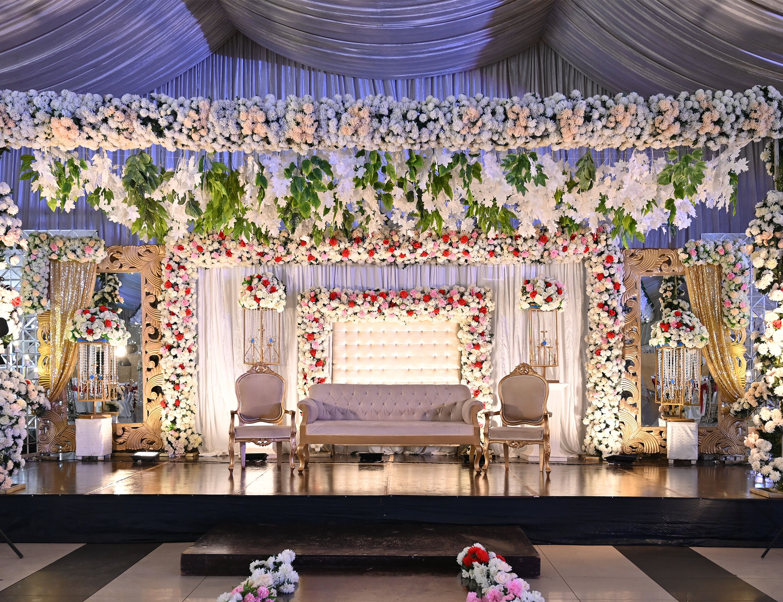 Wedding decor for Indian weddings with white flours and lighting